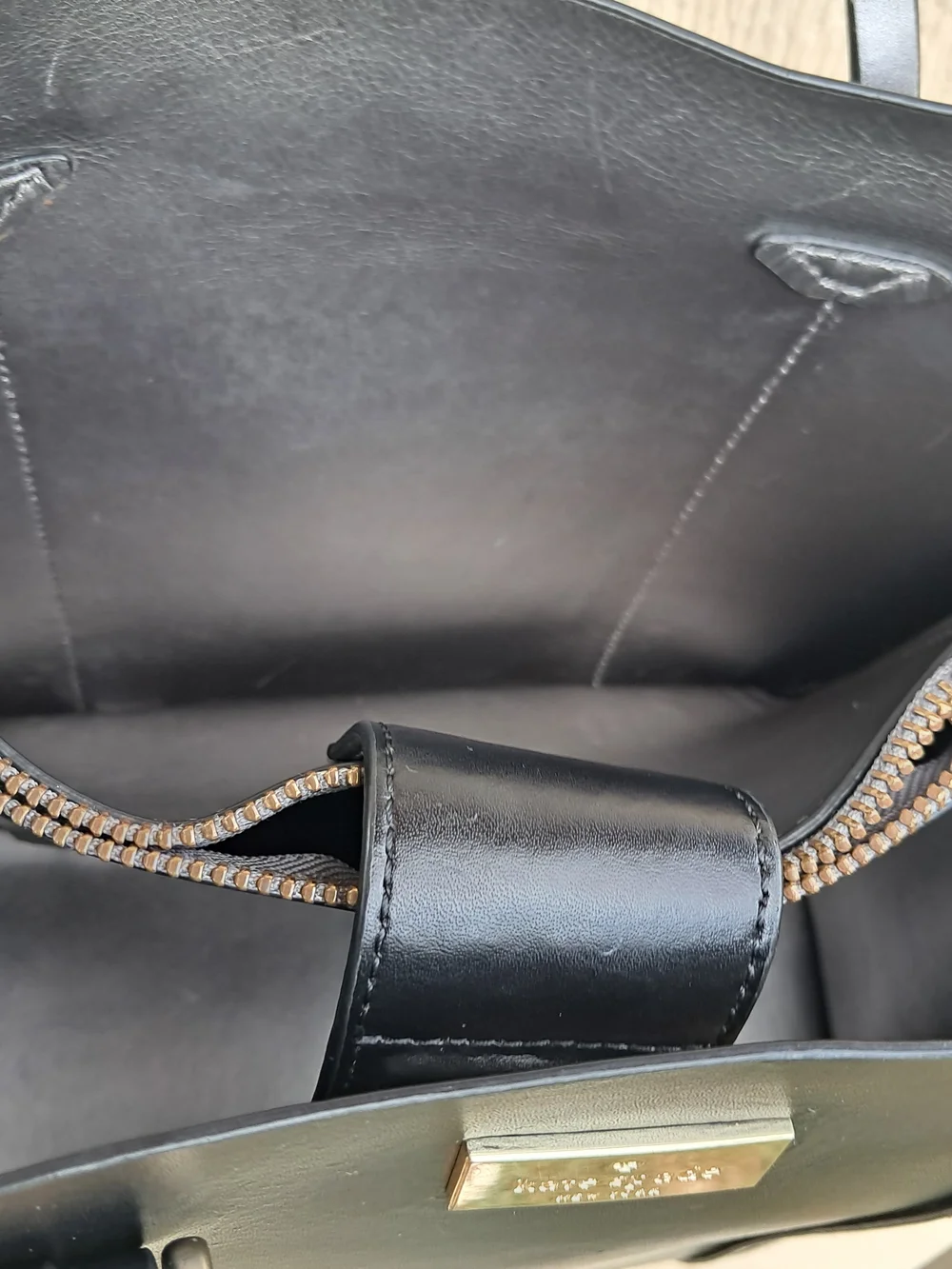 Kate Spade New York black leather tote bag with shoulder strap​